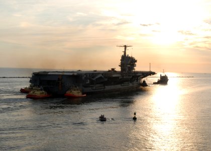 US Navy 070726-N-4565G-010 Decommissioned aircraft carrier John F. Kennedy (CV 67) departs Naval Station Mayport en route to Norfolk, Va