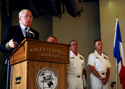 US Navy 070726-N-8132M-074 U.S. Ambassador to France, Craig Stapleton speaks to distinguished visitors, guests and crew members of the nuclear-powered aircraft carrier USS Enterprise (CVN 65) photo