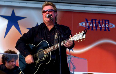 US Navy 070722-N-8848T-030 Country music recording artist Joe Diffie performs in front of Sailors and family members on Ross Field at Naval Station Great Lakes