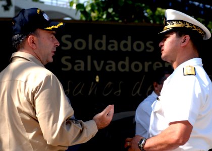 US Navy 070726-N-6278K-024 Capt. Bob Kapcio, mission commander aboard the Military Sealift Command hospital ship USNS Comfort (T-AH 20), speaks to Rear Adm. Palacios, Chief of Naval Operations of the Salvadoran Navy in Acajutla