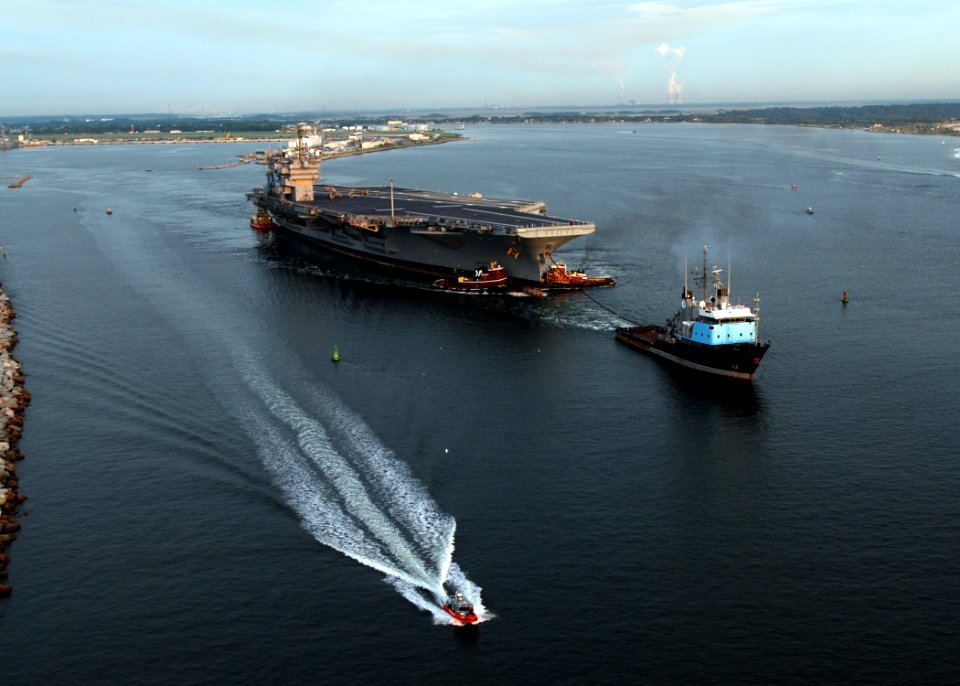 US Navy 070726-N-4565G-005 Decommissioned aircraft carrier John F. Kennedy (CV 67) departs Naval Station Mayport en route to Norfolk, Va