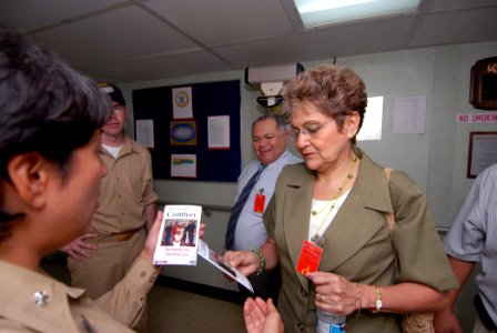 US Navy 070726-N-6081J-047 Cmdr. Sandra Hearn, a crew member aboard the Military Sealift Command hospital ship USNS Comfort (T-AH 20), shows Connie Portilla, wife of Carlos Portilla, mayor of the City of Izalco, El Salvador, a
