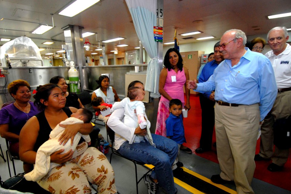 US Navy 070723-N-8704K-039 Nicaraguan Vice President Jaime Morales and Project Hope President Dr. John Howe visit with patients aboard Military Sealift Command hospital ship USNS Comfort (T-AH 20) off the coast of Corinto, Nica