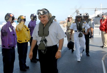 US Navy 070727-N-0194K-329 President Elias Saca of El Salvador passes through sideboys after arriving aboard the Military Sealift Command hospital ship USNS Comfort (T-AH 20)