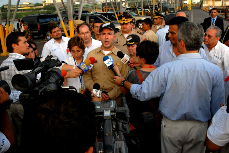 US Navy 070725-N-8704K-210 Capt. Bob Kapcio, Military Sealift Command hospital ship USNS Comfort (T-AH 20) mission commander, speaks with local media