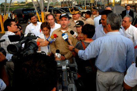 US Navy 070725-N-8704K-210 Capt. Bob Kapcio, Military Sealift Command hospital ship USNS Comfort (T-AH 20) mission commander, speaks with local media photo