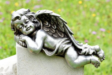 Guardian angel sculpture symbol