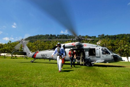 US Navy 070730-N-8704K-023 U.S. Ambassador to El Salvador Charles Glazer departs a MH-60S Seahawk assigned to Helicopter Sea Combat Squadron (HSC) 28 in San Salvador, after visiting the hospital ship USNS Comfort (T-AH 20)