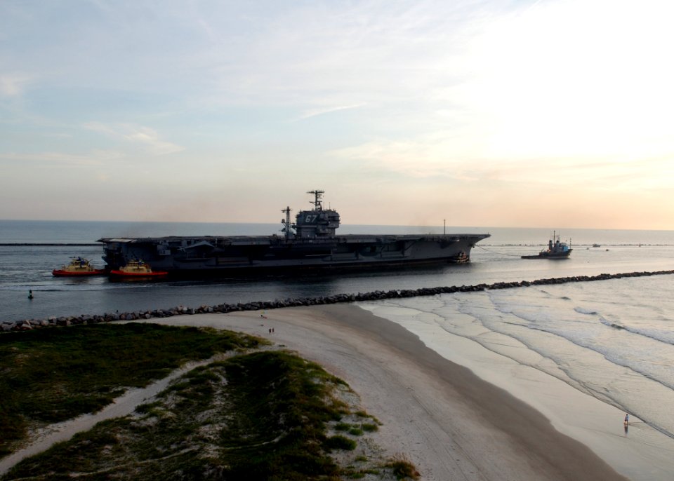 US Navy 070726-N-4565G-008 Decommissioned aircraft carrier John F. Kennedy (CV 67) departs Naval Station Mayport en route to Norfolk, Va
