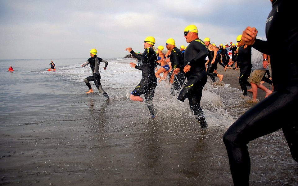 US Navy 070728-N-4774B-055 Athletes who have sustained injuries in combat participate in the 20th running of the Admiral's Cup Triathlon as part of Team Semper Fi