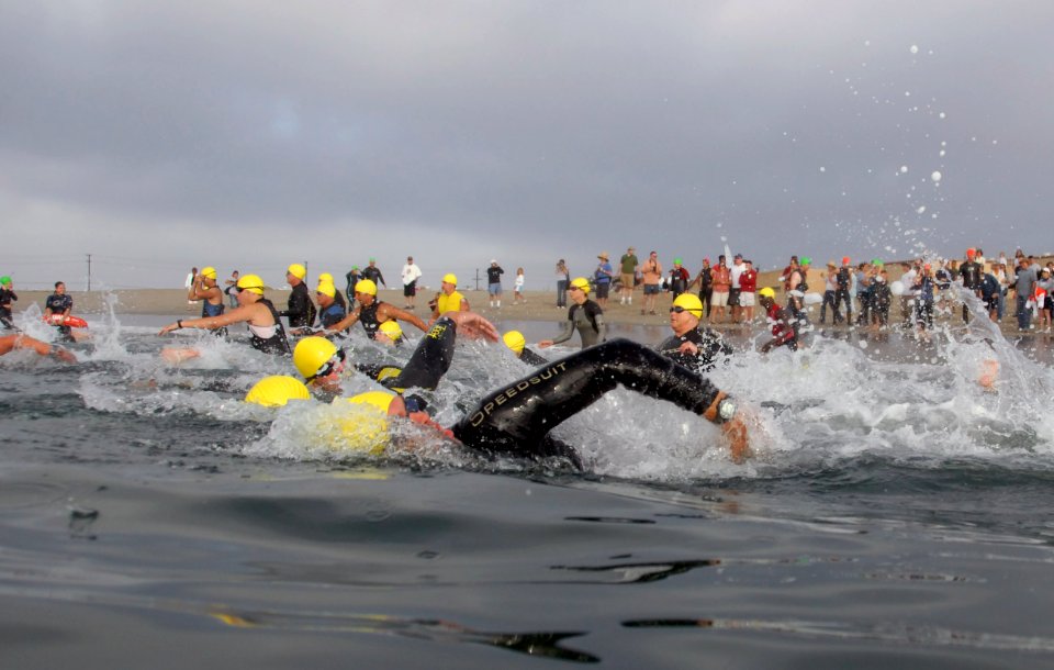 US Navy 070728-N-1722M-063 Members of the Team Semper-Fi start the swim portion of the Admiral's Cup at Point Mugu