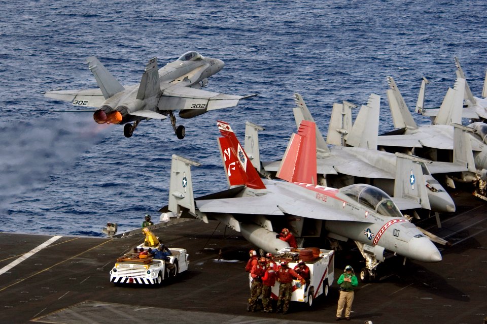 US Navy 070728-N-5387K-001 An F-A-18C Hornet assigned to the Golden Dragons of Strike Fighter Squadron (VFA) 192 launches from the flight deck of USS Kitty Hawk (CV 63)
