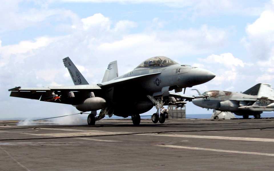 US Navy 070730-N-8923M-074 An F-A-18F Super Hornet from Strike Fighter Squadron (VFA) 11, the Red Rippers, completes an arrested recovery on the flight deck aboard the Nimitz-class aircraft carrier USS Harry S. Truman (CVN 75)