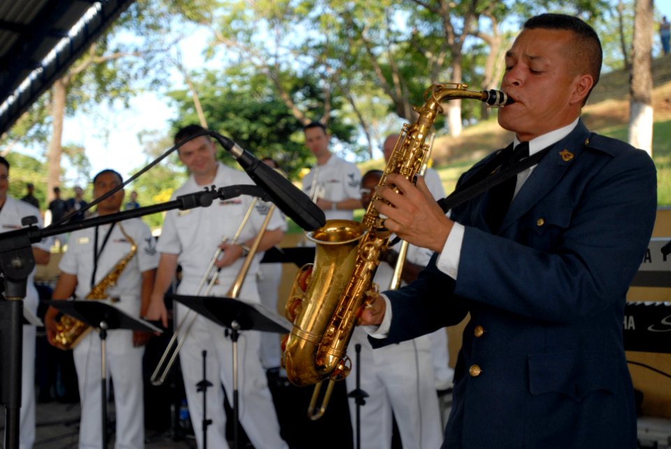 US Navy 070729-N-4238B-052 Salvadoran Army band saxophone player Sergeant 1st Class Julio Cesar Aguilar plays a solo during a U.S. Navy Showband performance at Parque de Acajutla