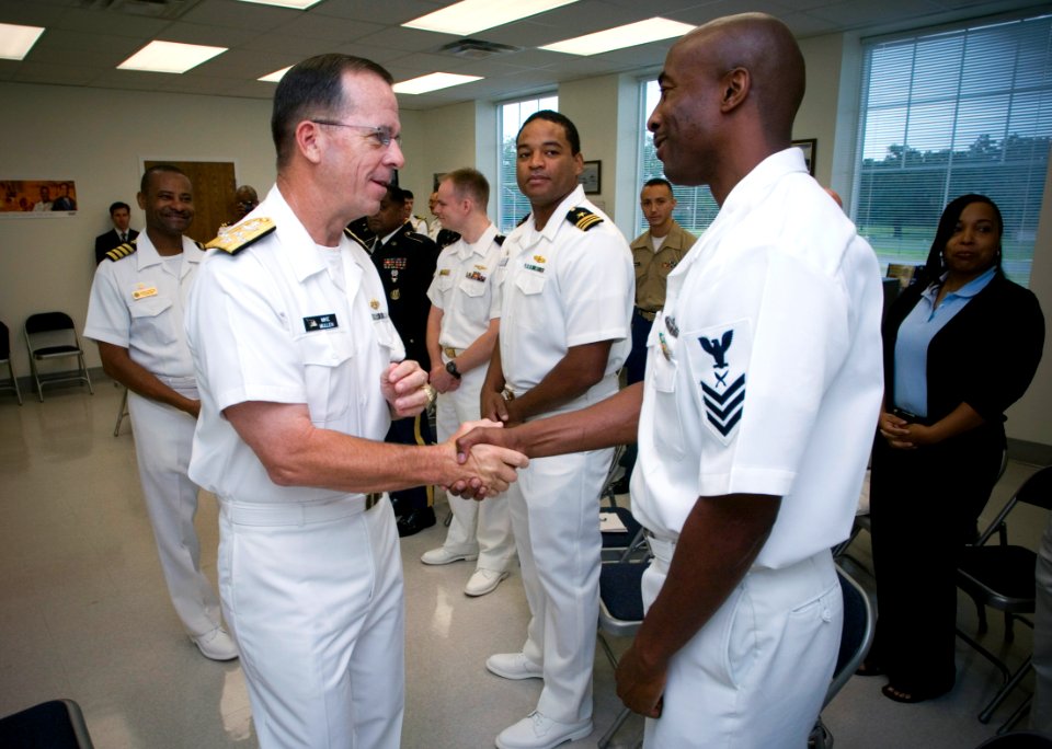US Navy 070727-N-0696M-244 Chief of Naval Operations, (CNO) Adm. Mike Mullen greets Yeoman 1st Class Isiah Curtis, assigned to the Reserve Officer Training Corps, Southern University prior to giving the commencement speech