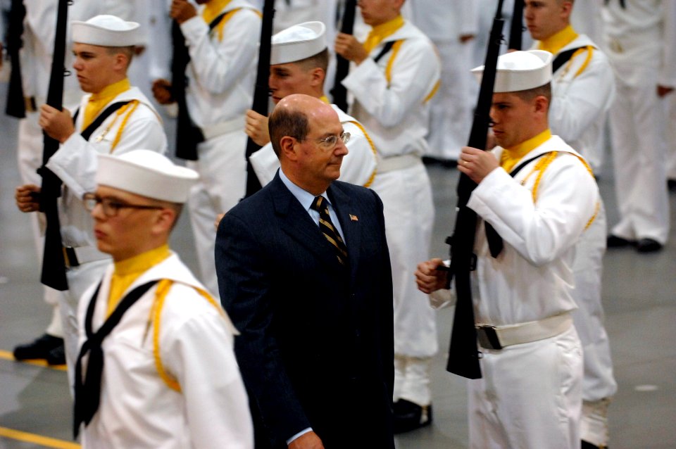 US Navy 070803-N-3642E-399 ecretary of the Navy (SECNAV) the Honorable Dr. Donald C. Winter inspects the drill team during graduating ceremonies held onboard Naval Station Great Lakes