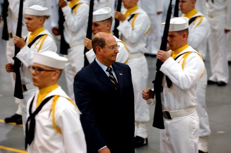 US Navy 070803-N-3642E-399 ecretary of the Navy (SECNAV) the Honorable Dr. Donald C. Winter inspects the drill team during graduating ceremonies held onboard Naval Station Great Lakes