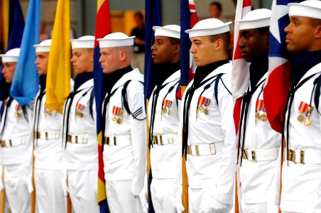 US Navy 070731-N-3642E-094 The Navy Ceremonial Honor Guard stands at attention during the commencement of the Navy District Washington's Concert on the Avenue photo