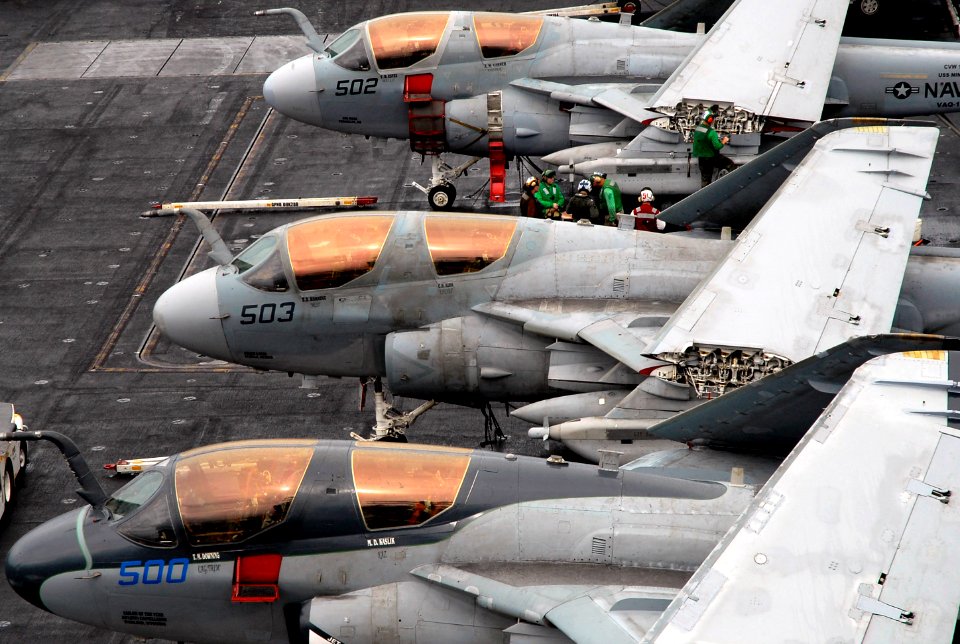 US Navy 070806-N-0890S-018 Sailors assigned to the Black Ravens of Electronic Attack Squadron (VAQ) 135, perform last minute maintenance on an EA-6B Prowlers before flight operation