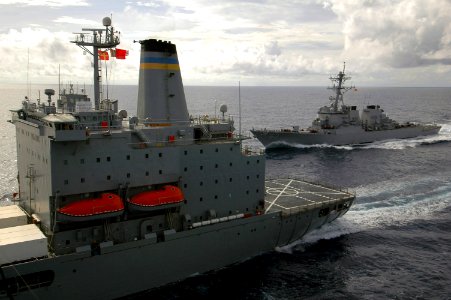 US Navy 070729-N-5387K-001 The guided-missile destroyer USS Stethem (DDG 63) pulls alongside the Military Sealift Command Fleet replenishment oiler USNS John Ericsson (T-AO 194), while USS Kitty Hawk (CV 63) refuels
