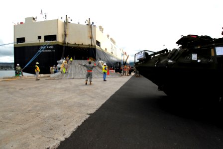 US Navy 070801-N-4965F-008 A U.S. Army Soldier directs Stryker's attached to the 25th Infantry Division, 2nd Stryker Brigade Combat Team (2SBCT)