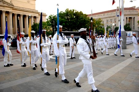 US Navy 070731-N-3642E-066 The Navy Ceremonial Honor Guard marches into the Memorial Plaza during the commencement of the Navy District Washington's Concert on the Avenue photo