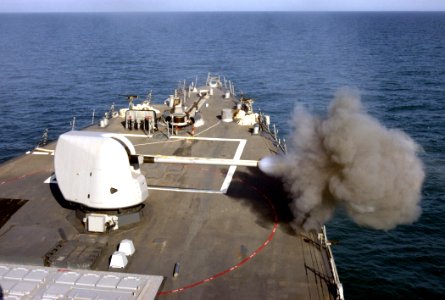 USS Carney fires its five inch deck gun