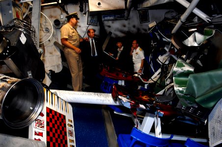 US Navy 070803-N-3642E-058 Secretary of the Navy (SECNAV) the Honorable Dr. Donald C. Winter walks through a simulated damaged berthing space, aboard USS Trayer (BST 21) photo