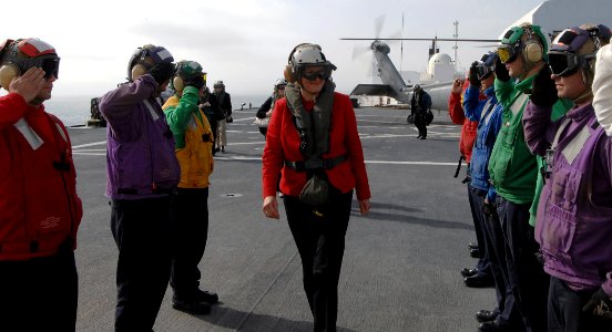 US Navy 070808-N-0194K-107 Under Secretary of State for Diplomacy and Public Affairs, walks through rainbow sideboys after landing the Military Sealift Command (MSC) hospital ship USNS Comfort (T-AH 20)
