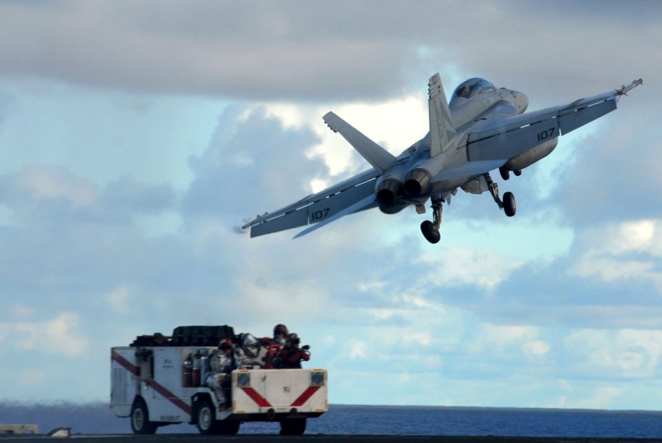 US Navy 070808-N-2659P-033 An F-A-18F Super Hornet assigned to the Black Knights of Strike Fighter Squadron (VFA) 154, launches from the flight deck of the Nimitz-class aircraft carrier USS John C. Stennis (CVN 74)