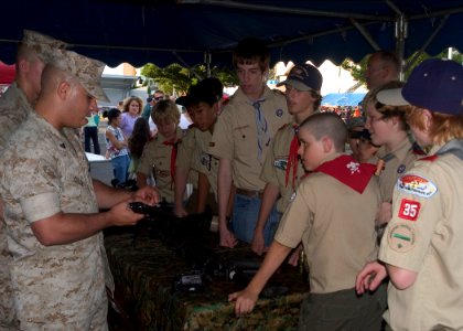US Navy 070807-N-0483B-005 Members of the 2nd Fleet Antiterrorism Security Team (FAST), 3rd Platoon demonstrate to Boy Scout troop 35 proper weapon handling during the 24th Annual National Night Out