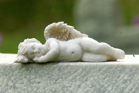 Guardian angel sculpture symbol