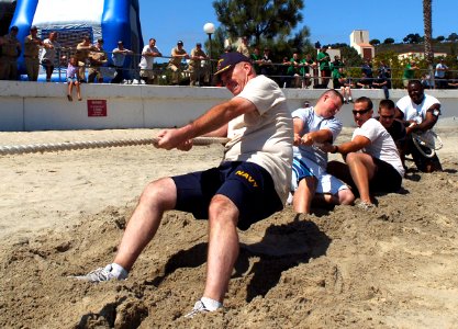 US Navy 070806-N-4163T-286 Commodore, Submarine Squadron 11, Capt. Paul N. Jaenichen and his teammates pull during the tug-of-war portion of the 2nd Annual Submarine Squadron 11 Commodores Cup Competition