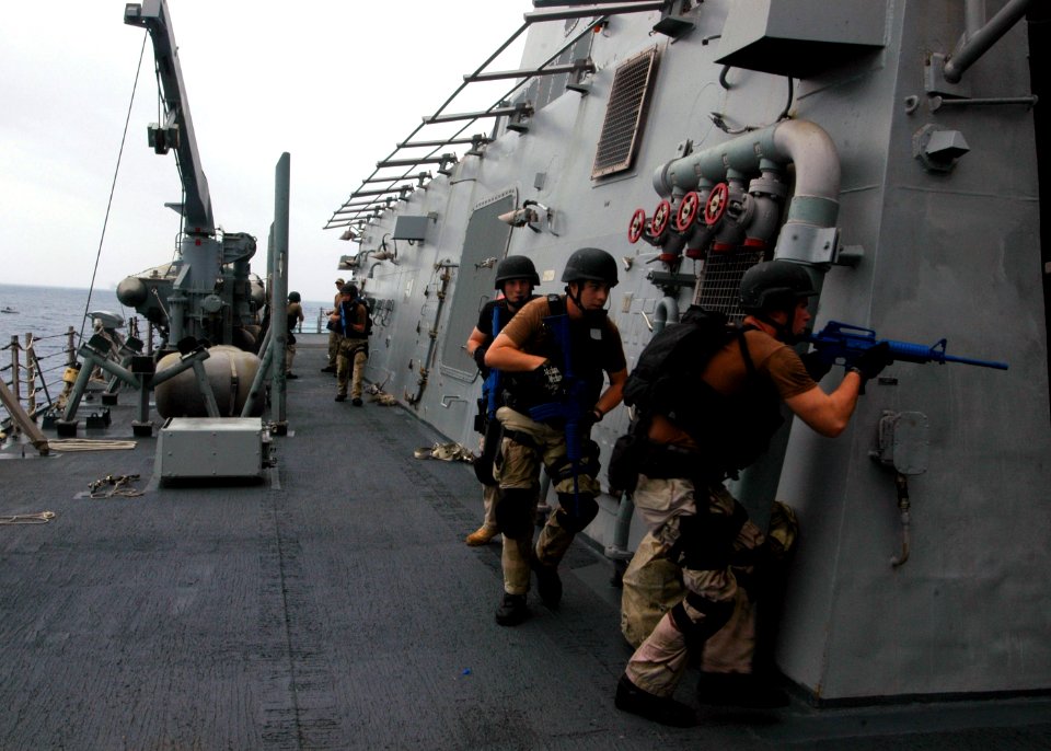 US Navy 070808-N-4014G-032 Members of the dock landing ship USS Gunston Hall (LSD 44) Visit, Boarding Search and Seizure (VBSS) Team conduct boarding exercises aboard the guided missile destroyer USS Porter (DDG 78)