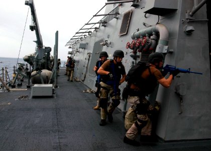 US Navy 070808-N-4014G-032 Members of the dock landing ship USS Gunston Hall (LSD 44) Visit, Boarding Search and Seizure (VBSS) Team conduct boarding exercises aboard the guided missile destroyer USS Porter (DDG 78)
