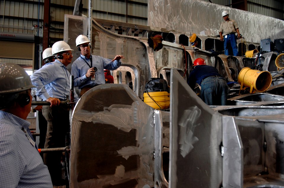 US Navy 070807-N-3642E-165 Secretary of the Navy (SECNAV) the Honorable Dr. Donald C. Winter, is given a tour of the aluminum hull of the pre-commissioned ship Independence (LCS 2) during a tour of Austal Shipyards