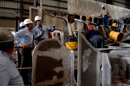 US Navy 070807-N-3642E-165 Secretary of the Navy (SECNAV) the Honorable Dr. Donald C. Winter, is given a tour of the aluminum hull of the pre-commissioned ship Independence (LCS 2) during a tour of Austal Shipyards