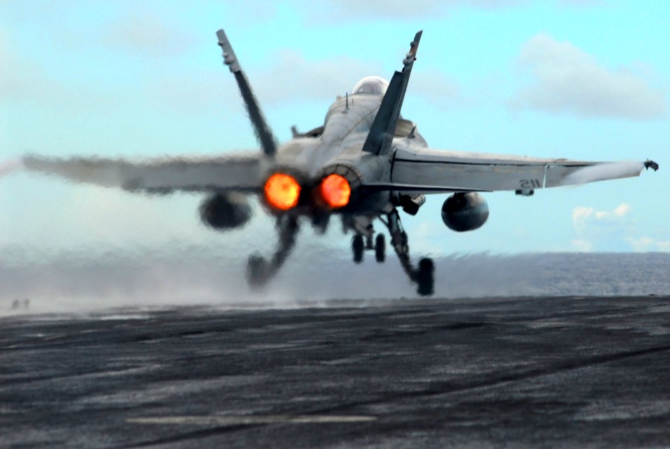 US Navy 070808-N-2659P-065 An F-A-18C Hornet assigned to the Death Rattlers of Marine Fighter Attack Squadron (VMFA) 323, attached to Carrier Air Wing (CVW) 9, launches from the flight deck of the Nimitz-class aircraft carrier