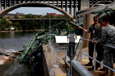 US Navy 070808-N-3642E-152 Secretary of the Navy (SECNAV) the Honorable Dr. Donald C. Winter tours the site of the fatal Interstate 35W bridge collapse