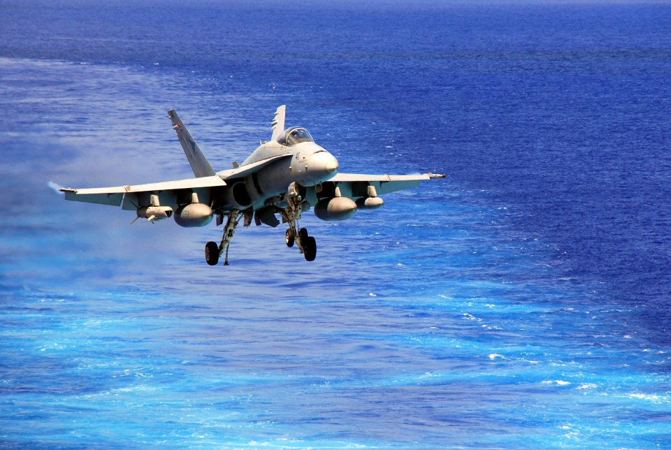 US Navy 070809-N-9760Z-044 An F-A-18C, assigned to the Sunliners of Strike Fighter Squadron (VFA) 81, prepares to land on the flight deck of the nuclear-powered aircraft carrier USS Nimitz (CVN 68)