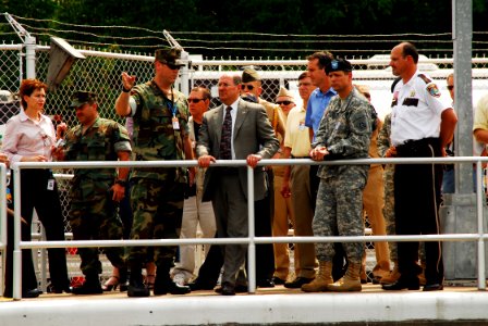 US Navy 070808-N-4515N-145 Secretary of the Navy (SECNAV) the Honorable Donald C. Winter, center, meets with Department of Defense, federal, state, and local officials at the scene of the I-35 bridge collapse