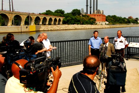 US Navy 070808-N-4515N-434 Secretary of the Navy (SECNAV) the Honorable Donald C. Winter, conducts a media availability at the scene of the I-35 bridge collapse