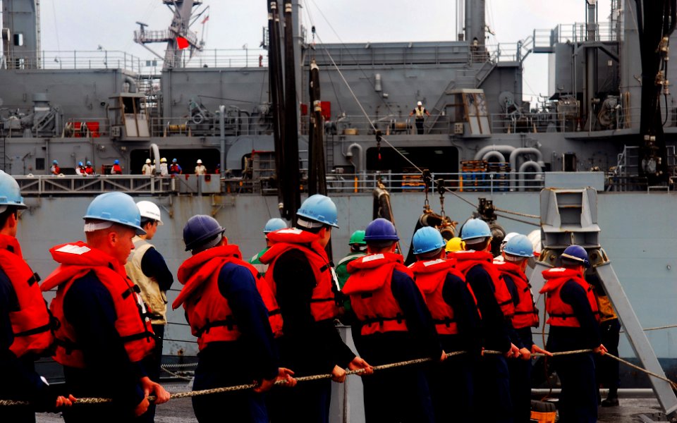 US Navy 070811-N-0684R-031 Sailors aboard the guided-missile destroyer USS Preble (DDG 88) hold a phone and distance line between Preble and the Military Sealift Command (MSC) fast-combat support ship USNS Bridge (T-AOE 10) dur
