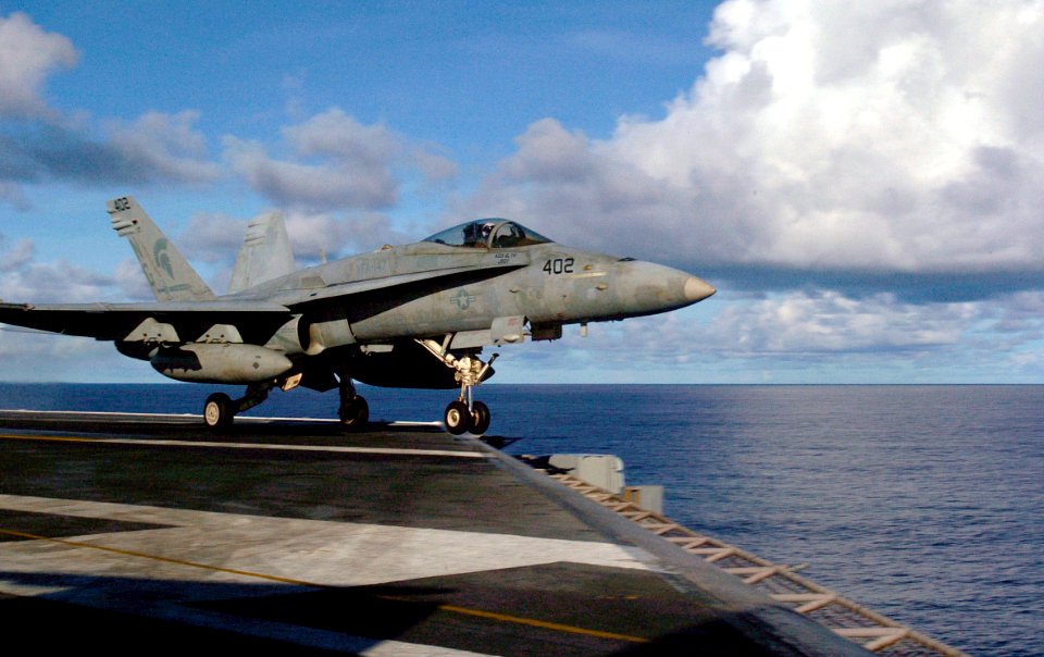 US Navy 070809-N-3038W-036 An F-A-18C Hornet assigned to Strike Fighter Squadron (VFA) 147 launches from the flight deck of the USS John C. Stennis (CVN 74)