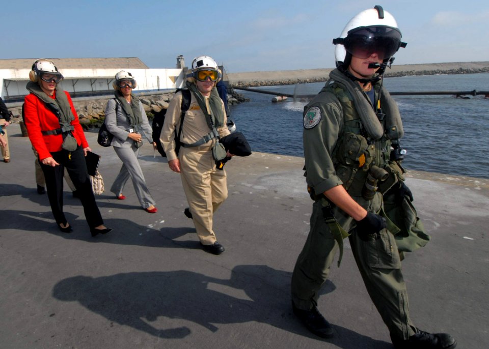 US Navy 070808-N-8704K-497 Under Secretary for Diplomacy and Public Affairs Karen Hughes (left) and the Mission Commander Capt. Bob Kapcio aboard the Military Sealift Command (MSC) hospital ship USNS Comfort (T-AH 20), are led
