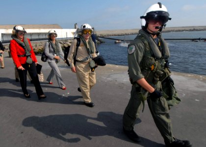 US Navy 070808-N-8704K-497 Under Secretary for Diplomacy and Public Affairs Karen Hughes (left) and the Mission Commander Capt. Bob Kapcio aboard the Military Sealift Command (MSC) hospital ship USNS Comfort (T-AH 20), are led