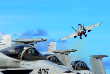 US Navy 070809-N-2659P-109 An F-A-18F Super Hornet assigned to Strike Fighter Squadron (VFA) 154, assigned to Carrier Air Wing (CVW) 9, launches from the flight deck of the Nimitz-class aircraft carrier USS John C. Stennis (CVN