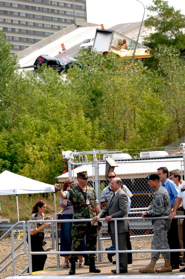 US Navy 070808-N-3642E-163 Secretary of the Navy (SECNAV) the Honorable Dr. Donald C. Winter tours the site of the fatal Interstate 35W bridge collapse