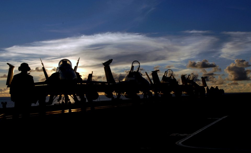 US Navy 070809-N-3729H-264 Aircraft, assigned to Carrier Air Wing (CVW) 9, are secured to the flight deck of the Nimitz-class aircraft carrier USS John C. Stennis (CVN 74) following a long day of flight operations