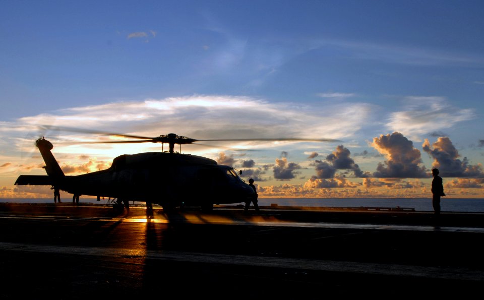 US Navy 070809-N-3729H-337 An SH-60F assigned to the Eightballers of Helicopter Anti-Submarine Squadron (HS) 8 lands on the flight deck of the Nimitz-class aircraft carrier USS John C. Stennis (CVN 74)